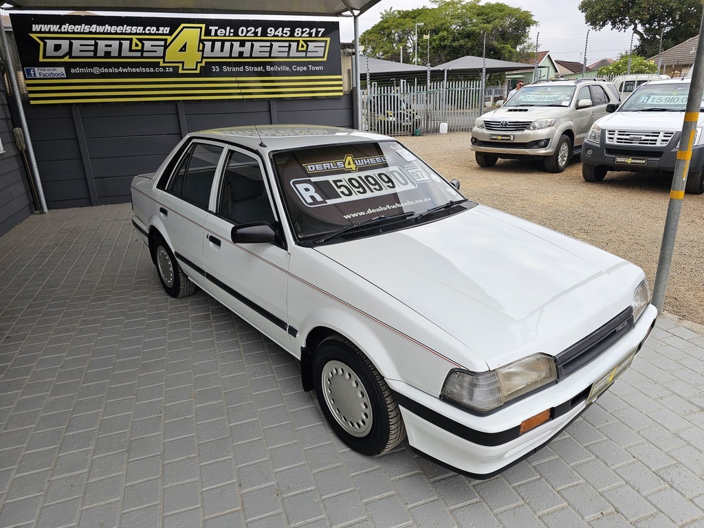1997 MAZDA 323 160 MIDGE S/D