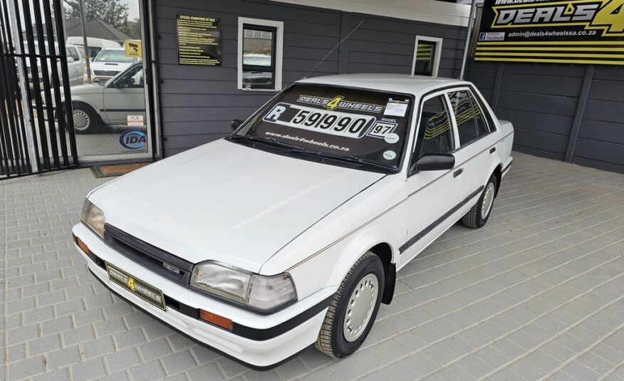 1997 MAZDA 323 160 MIDGE S/D