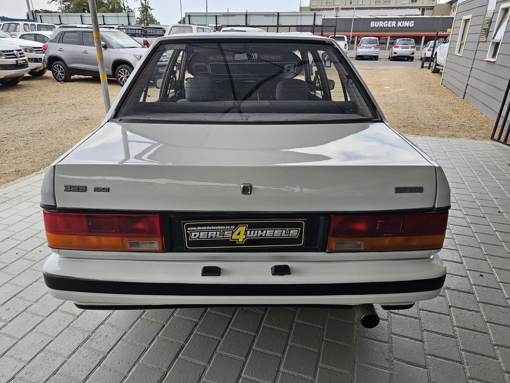 1997 MAZDA 323 160 MIDGE S/D
