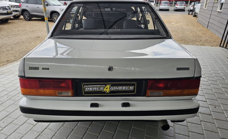 1997 MAZDA 323 160 MIDGE S/D
